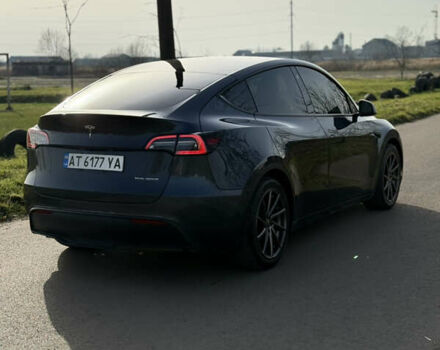 Серый Тесла Model Y, объемом двигателя 0 л и пробегом 84 тыс. км за 22999 $, фото 2 на Automoto.ua