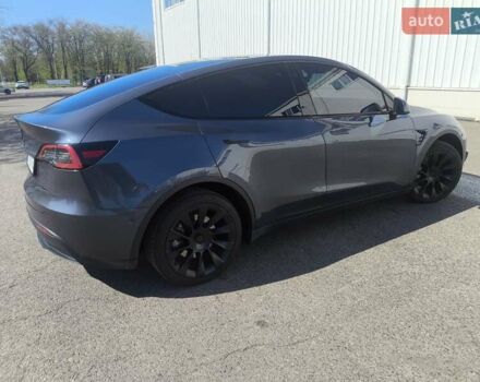 Серый Тесла Model Y, объемом двигателя 0 л и пробегом 77 тыс. км за 30999 $, фото 24 на Automoto.ua