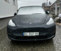 Серый Тесла Model Y, объемом двигателя 0 л и пробегом 22 тыс. км за 27000 $, фото 1 на Automoto.ua