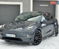 Серый Тесла Model Y, объемом двигателя 0 л и пробегом 102 тыс. км за 25499 $, фото 1 на Automoto.ua