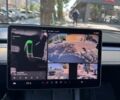 Серый Тесла Model Y, объемом двигателя 0 л и пробегом 50 тыс. км за 26500 $, фото 1 на Automoto.ua