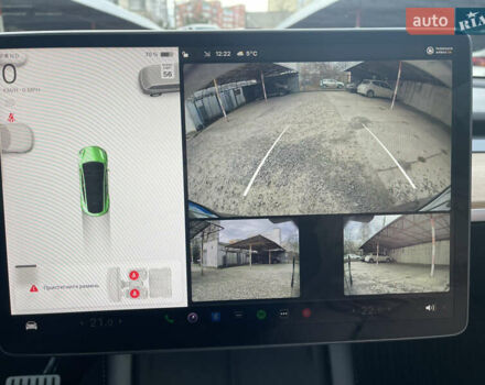 Серый Тесла Model Y, объемом двигателя 0 л и пробегом 65 тыс. км за 27400 $, фото 3 на Automoto.ua