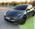 Серый Тесла Model Y, объемом двигателя 0 л и пробегом 48 тыс. км за 27500 $, фото 1 на Automoto.ua