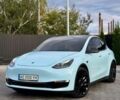 Серый Тесла Model Y, объемом двигателя 0 л и пробегом 60 тыс. км за 24900 $, фото 1 на Automoto.ua