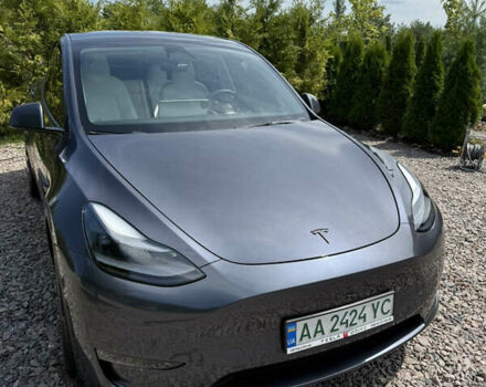 Серый Тесла Model Y, объемом двигателя 0 л и пробегом 61 тыс. км за 33000 $, фото 2 на Automoto.ua