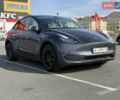 Серый Тесла Model Y, объемом двигателя 0 л и пробегом 26 тыс. км за 23200 $, фото 1 на Automoto.ua