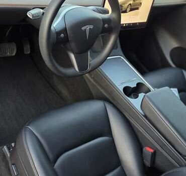 Серый Тесла Model Y, объемом двигателя 0 л и пробегом 77 тыс. км за 25499 $, фото 11 на Automoto.ua