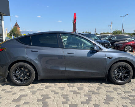 Серый Тесла Model Y, объемом двигателя 82 л и пробегом 22 тыс. км за 27000 $, фото 4 на Automoto.ua