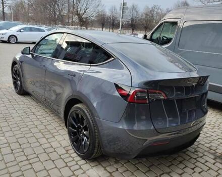 Серый Тесла Model Y, объемом двигателя 0 л и пробегом 50 тыс. км за 25990 $, фото 3 на Automoto.ua