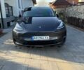 Серый Тесла Model Y, объемом двигателя 0 л и пробегом 23 тыс. км за 29900 $, фото 1 на Automoto.ua
