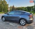 Серый Тесла Model Y, объемом двигателя 0 л и пробегом 49 тыс. км за 27950 $, фото 1 на Automoto.ua