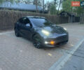 Серый Тесла Model Y, объемом двигателя 0 л и пробегом 69 тыс. км за 29999 $, фото 2 на Automoto.ua