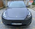 Серый Тесла Model Y, объемом двигателя 0 л и пробегом 27 тыс. км за 25900 $, фото 6 на Automoto.ua