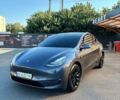 Серый Тесла Model Y, объемом двигателя 0 л и пробегом 55 тыс. км за 29000 $, фото 1 на Automoto.ua