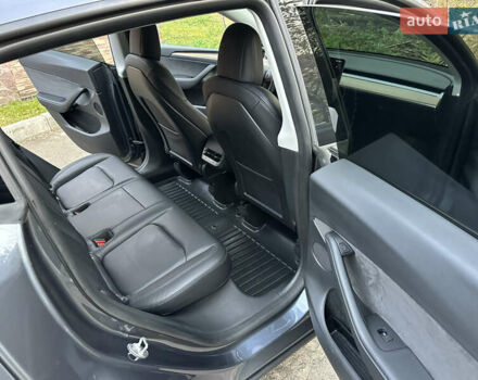 Серый Тесла Model Y, объемом двигателя 0 л и пробегом 95 тыс. км за 24900 $, фото 12 на Automoto.ua