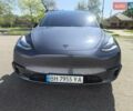 Серый Тесла Model Y, объемом двигателя 0 л и пробегом 77 тыс. км за 30999 $, фото 6 на Automoto.ua