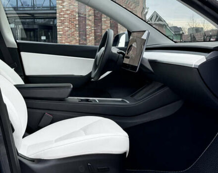 Серый Тесла Model Y, объемом двигателя 0 л и пробегом 26 тыс. км за 28900 $, фото 48 на Automoto.ua