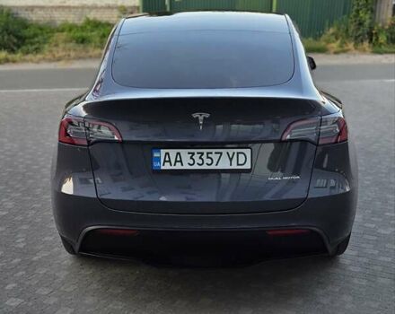 Серый Тесла Model Y, объемом двигателя 0 л и пробегом 77 тыс. км за 25499 $, фото 2 на Automoto.ua