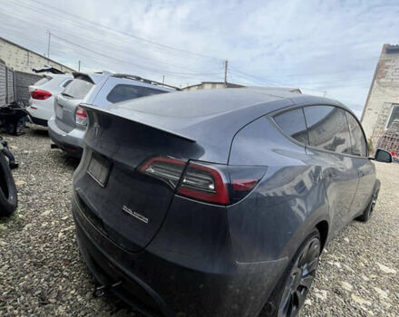 Серый Тесла Model Y, объемом двигателя 0 л и пробегом 99 тыс. км за 19600 $, фото 2 на Automoto.ua