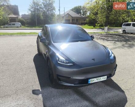 Серый Тесла Model Y, объемом двигателя 0 л и пробегом 77 тыс. км за 30999 $, фото 4 на Automoto.ua