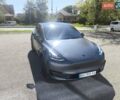 Серый Тесла Model Y, объемом двигателя 0 л и пробегом 77 тыс. км за 30999 $, фото 4 на Automoto.ua