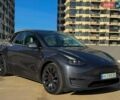 Серый Тесла Model Y, объемом двигателя 0 л и пробегом 26 тыс. км за 24900 $, фото 1 на Automoto.ua