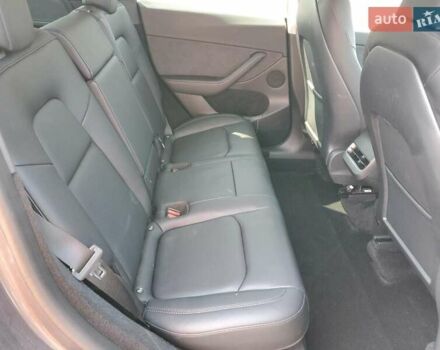 Серый Тесла Model Y, объемом двигателя 0 л и пробегом 28 тыс. км за 12400 $, фото 9 на Automoto.ua