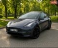 Серый Тесла Model Y, объемом двигателя 0 л и пробегом 106 тыс. км за 25000 $, фото 1 на Automoto.ua