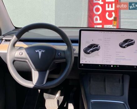 Серый Тесла Model Y, объемом двигателя 0 л и пробегом 18 тыс. км за 27300 $, фото 17 на Automoto.ua