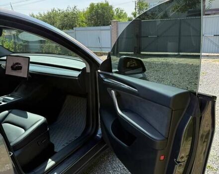 Серый Тесла Model Y, объемом двигателя 0 л и пробегом 27 тыс. км за 30400 $, фото 6 на Automoto.ua