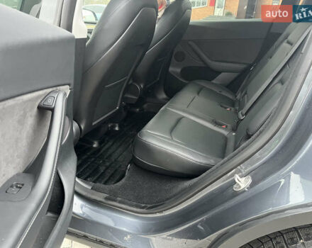 Серый Тесла Model Y, объемом двигателя 0 л и пробегом 56 тыс. км за 28001 $, фото 3 на Automoto.ua