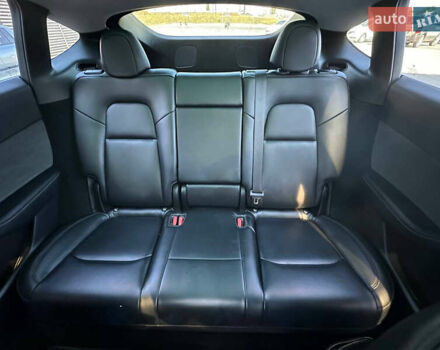 Серый Тесла Model Y, объемом двигателя 0 л и пробегом 93 тыс. км за 27900 $, фото 15 на Automoto.ua