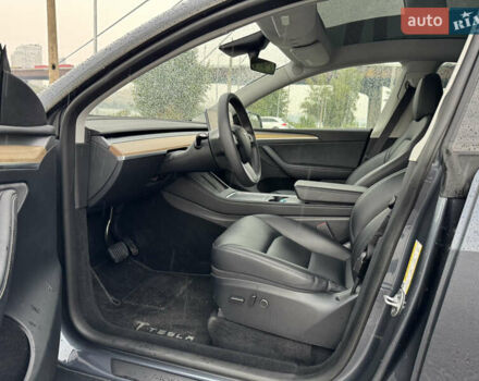 Серый Тесла Model Y, объемом двигателя 0 л и пробегом 66 тыс. км за 27900 $, фото 13 на Automoto.ua