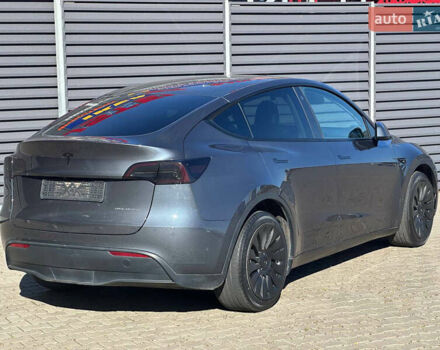 Серый Тесла Model Y, объемом двигателя 0 л и пробегом 93 тыс. км за 27900 $, фото 5 на Automoto.ua