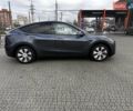 Серый Тесла Model Y, объемом двигателя 0 л и пробегом 24 тыс. км за 28399 $, фото 3 на Automoto.ua
