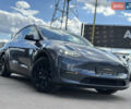 Серый Тесла Model Y, объемом двигателя 0 л и пробегом 46 тыс. км за 29900 $, фото 2 на Automoto.ua