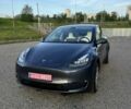 Серый Тесла Model Y, объемом двигателя 0 л и пробегом 22 тыс. км за 28999 $, фото 1 на Automoto.ua