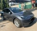 Серый Тесла Model Y, объемом двигателя 0 л и пробегом 31 тыс. км за 26500 $, фото 1 на Automoto.ua