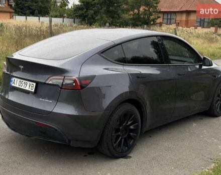 Серый Тесла Model Y, объемом двигателя 0 л и пробегом 57 тыс. км за 31333 $, фото 1 на Automoto.ua
