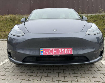 Серый Тесла Model Y, объемом двигателя 0 л и пробегом 64 тыс. км за 27300 $, фото 1 на Automoto.ua