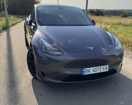Серый Тесла Model Y, объемом двигателя 0 л и пробегом 29 тыс. км за 27500 $, фото 1 на Automoto.ua
