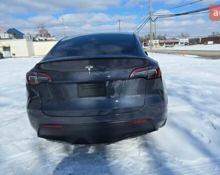Серый Тесла Model Y, объемом двигателя 0 л и пробегом 56 тыс. км за 15500 $, фото 2 на Automoto.ua