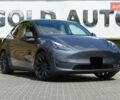 Серый Тесла Model Y, объемом двигателя 0 л и пробегом 33 тыс. км за 27999 $, фото 1 на Automoto.ua