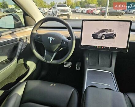 Серый Тесла Model Y, объемом двигателя 0 л и пробегом 34 тыс. км за 28300 $, фото 22 на Automoto.ua