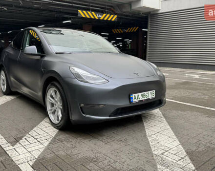 Серый Тесла Model Y, объемом двигателя 0 л и пробегом 22 тыс. км за 33000 $, фото 1 на Automoto.ua