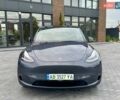 Серый Тесла Model Y, объемом двигателя 0 л и пробегом 17 тыс. км за 35999 $, фото 3 на Automoto.ua