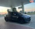 Серый Тесла Model Y, объемом двигателя 0 л и пробегом 20 тыс. км за 29999 $, фото 1 на Automoto.ua
