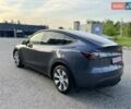 Серый Тесла Model Y, объемом двигателя 0 л и пробегом 22 тыс. км за 28999 $, фото 1 на Automoto.ua