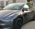 Серый Тесла Model Y, объемом двигателя 0 л и пробегом 23 тыс. км за 28600 $, фото 1 на Automoto.ua