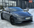 Серый Тесла Model Y, объемом двигателя 0 л и пробегом 26 тыс. км за 33500 $, фото 1 на Automoto.ua